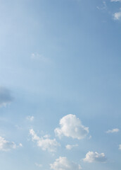 Blue sky and white puffy clouds.