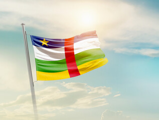 Central African Republic national flag waving in the sky with mast. 