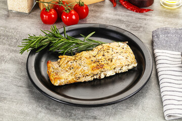 Baked salmon fish served rosemary