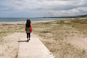 Tourist on Arealonga Beach. Reinante, Lugo. Galicia