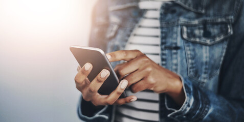 Hands, typing and woman with phone in studio for email, contact or text on internet connection. Scroll, smartphone and girl on mobile app for online chat, social media or web post on white background