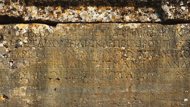 Ancient Stone Inscriptions Close-Up Textured Surface