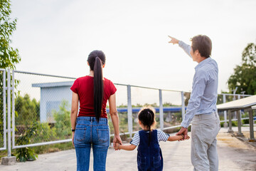 A modern father shows the potential of alternative energy to his family.