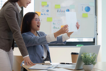 Business women working analyzing with financial data and marketing at meeting room
