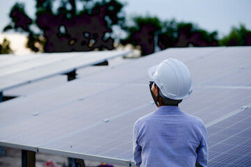Female electrical engineering team installs and inspects solar photovoltaic panels. Clean and environmentally friendly alternative energy.