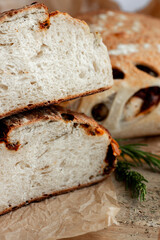 Savor Rustic Artisan Bread with butter, olives for a delicious blend of crunchy and rich flavors