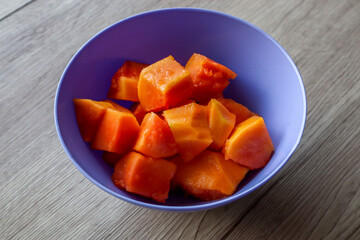 A Bowl of Sliced Papaya Ready to Eat