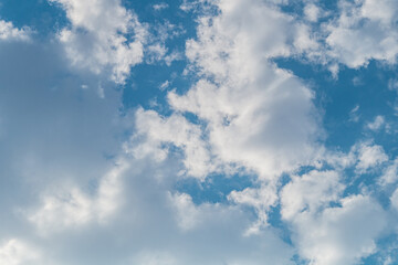 White patches of diverging light clouds on blue sky symbolize spirit of freedom, change, movement of horoscope signs, air element, Aquarius, Gemini, Libra. Mobile energy charged for transformation