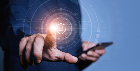 Cybersecurity and privacy concepts to protect data. Businessman use smartphone with cyber security technology for protecting personal data and secure internet access.