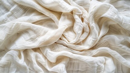 Obraz premium A close-up view of a bed with a white sheet, suitable for use in interior design or lifestyle photography