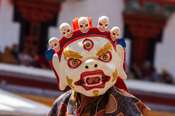 A colorful mask dance being performed at Hemis Monastery at Leh, Ladakh India.