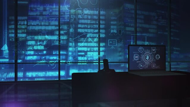 Cybersecurity charts on laptop screen in dark office.