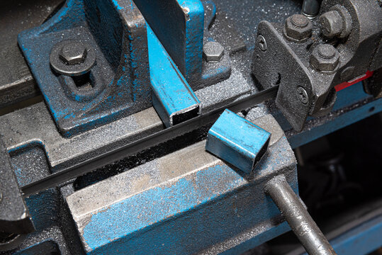 Metal cutting Horizontal Band Saw, finished cut through square tube. Metal saw.