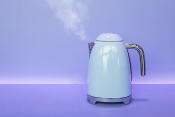 Electric kettle water boil hot smoke, modern minimal contemporary industrial design kitchenware with copy space for text