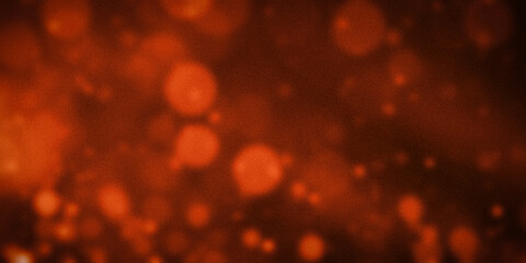 Warm orange gradient background with soft, glowing bokeh effect, creating a cozy and inviting atmosphere. Ideal for autumn themes, festive designs, and vibrant projects