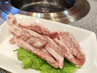 Fototapeta premium Raw thick sliced pork for yakiniku.