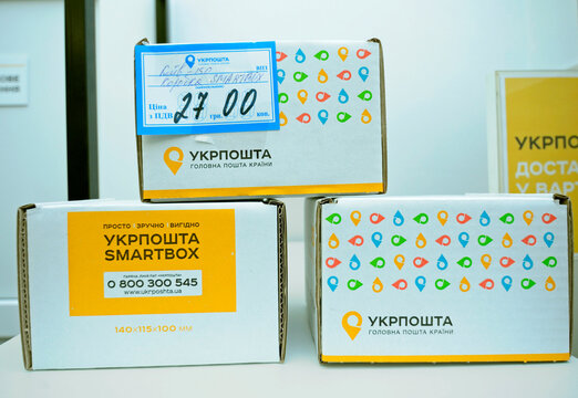 Post office. Parcels in boxes placed on a table to send, service SmartBox advance payment for postage by the state enterprise Ukrposhta. Kyiv, Ukraine