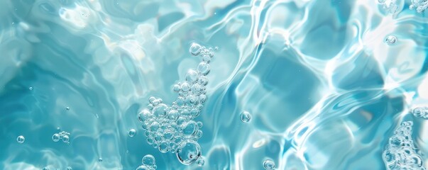 Naklejka premium A body of water with many bubbles floating on the surface. The bubbles are scattered throughout the water, creating a sense of movement and energy. The blue color of the water