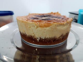 home made newyork cheese cake in air fryer. home made baked cheese cake with the base made of biscuites. awesome dessert to enjoy with family 