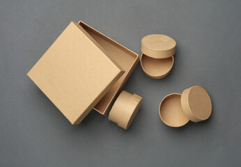 Cardboard craft boxes on a dark gray background