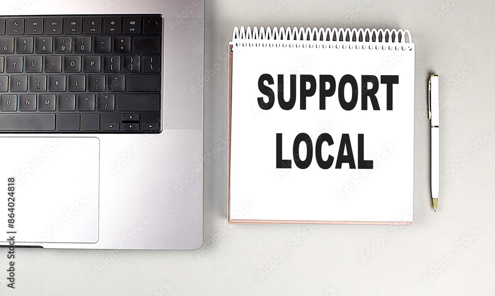 Poster support local text on notebook with laptop, mouse and pen