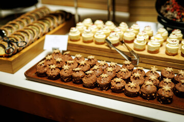 Assortment of chocolates on a hotel buffet.
