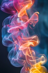Obraz premium Colorful smoke forming intricate patterns, symbolizing the ephemeral and evolving nature of creative processes 