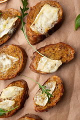 Gourmet toast medley with melting brie cheese and aromatic herbs. 