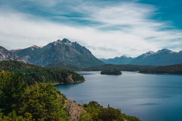 A beautiful lake with a small island in the middle