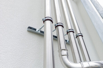 Cooling System Pipes Mounted on Wall