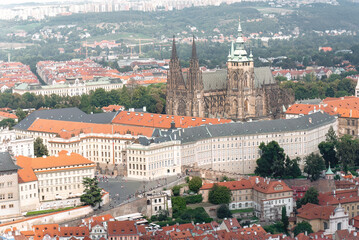 Fototapeta premium Prague castle towering over the urban landscape of Prague, Czech Republic