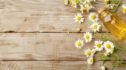 Obraz premium A glass bottle of chamomile essential oil with a dropper sits on a white wooden surface, surrounded by chamomile flowers
