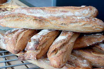 sourdough baguettes bread after baked prepare for sale at a bakery shop.