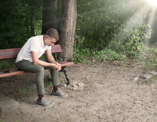 Sad men sitting on the bench