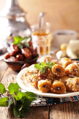 Traditional arabic dessert- baklava, date fruit and mint tea