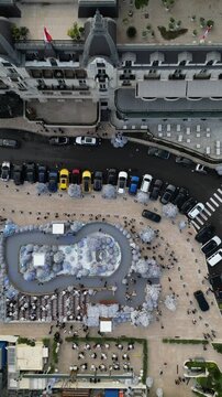 Aerial drone shot captures the bustling streets and architecture of Monaco.