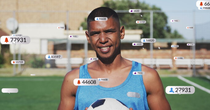 Image of multiple notification bars, portrait of biracial male soccer player standing in ground - Powered by Adobe