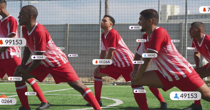 Image of multiple graphs over diverse soccer player doing stretching against nets on ground - Powered by Adobe