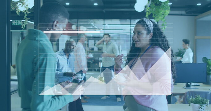 Image of graphs and loading bar, diverse coworkers discussing while drinking beverage in office
