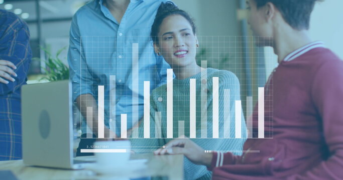 Image of graph and loading bars over diverse coworkers discussing reports in office