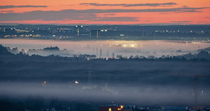 Time lapse of a mist covering the cityscape of Vantaa, sunrise in Finland