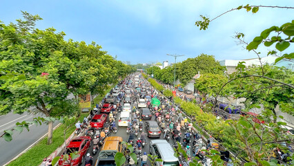 Ho Chi Minh City, Vietnam - May 20, 2024: Rush hour traffic situation on main road in the morning...