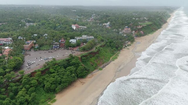 Shoreline of Varkala Cliff Beach, drone view of Varkala beach from the top of the cliff also known as Papanasham Beach, Thiruvananthapuram, Kerala, India