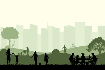 View of family holiday in the park with city buildings background