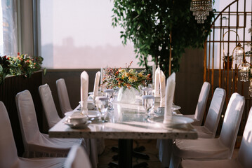 Elegant dining table with luxurious decor, perfect for a refined dining experience.