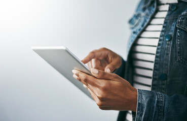 Hands, research and woman with tablet in studio for email, contact or networking on internet space....