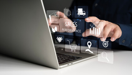 Sales performance management concept. Businessman use laptop to analyze data and sales performance.