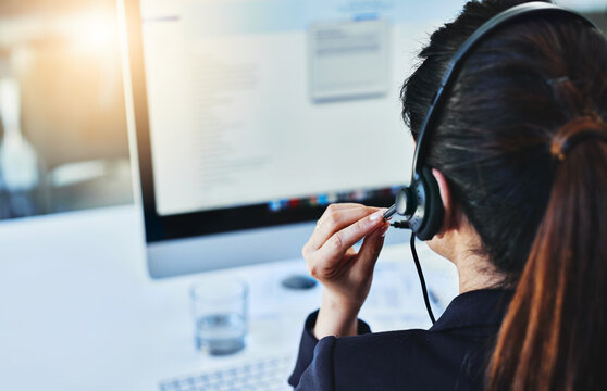 Woman, headset and call center in office, crm and customer service for conversation and online support. Computer, telemarketing and consultant for career, operator and female person for hotline agent