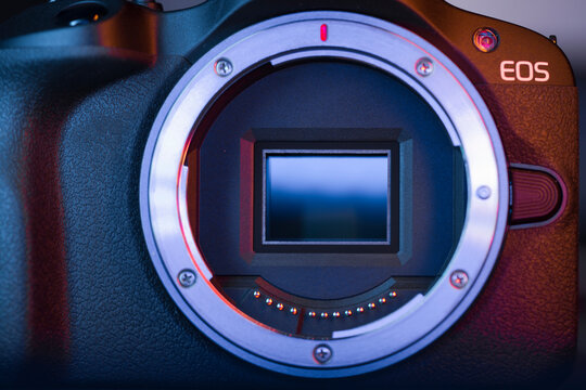 Milan, Italy - June 11, 2024: Close up on a modern Canon EOS R100 mirrorless camera sensor.