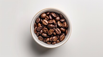 Fototapeta premium coffee beans in white cup isolated on white background